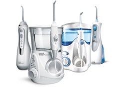 A set of Waterpik water flossers